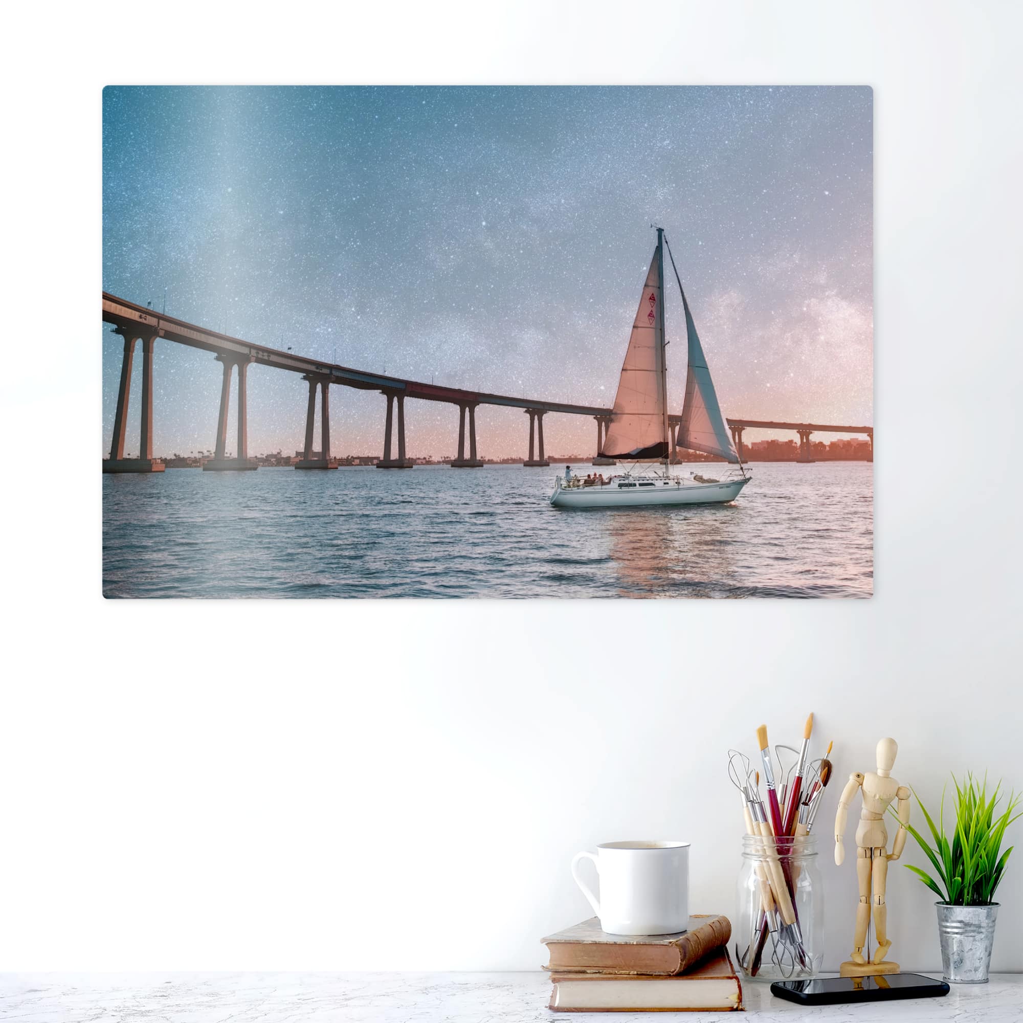 Metal print of Evening Passage displayed on a modern white wall above a desk.